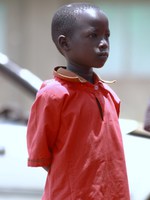 boy in red shirt Kisumu, Jinja, East Africa, Kenya, Uganda, Africa