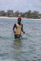 starfish man Diani Beach, East Africa, Kenya, Africa