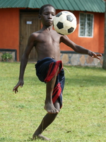 soccer boy Bugala Island, East Africa, Uganda, Africa