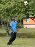 staff and soccer Bugala Island, East Africa, Uganda, Africa