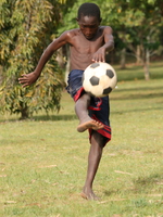 soccer boy Bugala Island, East Africa, Uganda, Africa