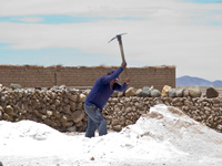 salt worker in colchani Salar de Uyuni, Potosi Department, Bolivia, South America