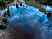 view--hikers reflection Sao Jorge, Goias (GO), Brazil, South America